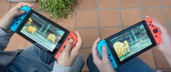 Портативная игровая приставка Nintendo Switch with Neon Blue and Neon Red Joy-Con